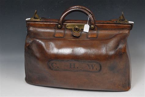 Check out our gladstone bag selection for the very best in unique or custom, handmade pieces from our bags & purses shops. Victorian leather Gladstone bag, of typical form, brass ...