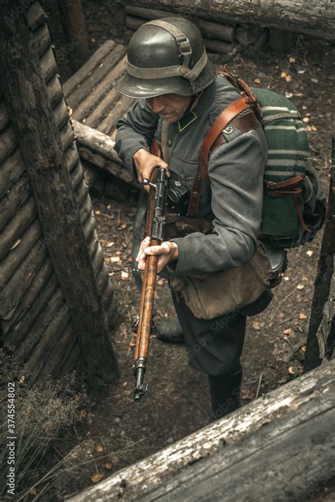 A Soldier In The Uniform Of The Finnish Army Of World War Ii With A