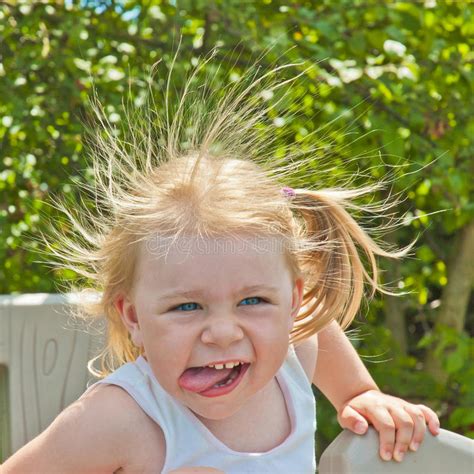 Little Girl With A Funny Face Stock Photo Image Of Toothy Happiness