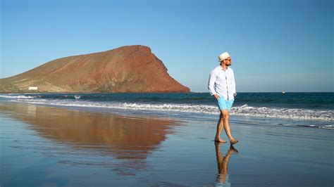 Happy Man Walking Along Ocean Beach At Stock Footage Sbv 324149787