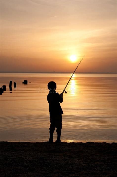 Silhouette Of A Boy Fisherman Stock Image Image Of Background