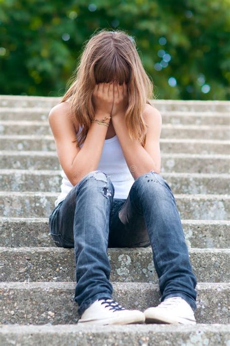 Sad Teenage Girl Sitting Alone On The Stairs Stock Image Image Of