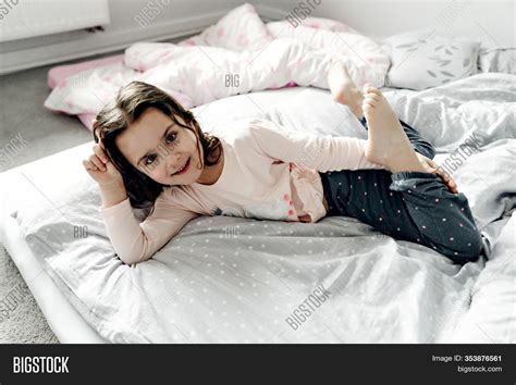 Girl On Bedtop View Image And Photo Free Trial Bigstock