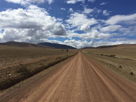 Long Straight Dirt Road In The Cuzco Region Photo