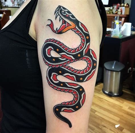 Its skin colour varies across the habitats , from black with white stripes to unbroken brownish grey. Sunset Tattoo | Traditional snake tattoo, Snake tattoo design, Snake traditional tattoo