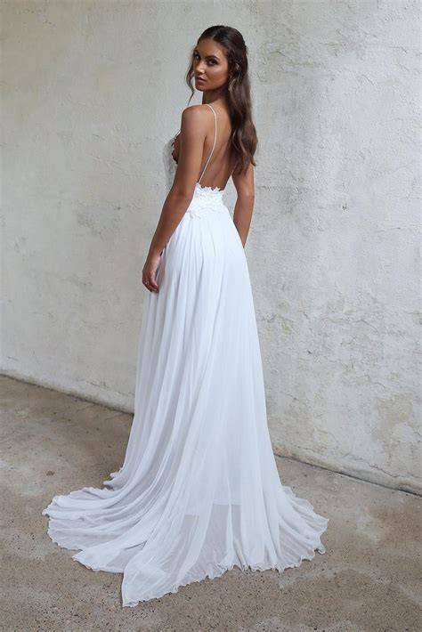 Simple silk wedding dresses are the ideal fit for modest brides who do not want a lot of frills or embellishments. Beautiful A Line Lace Long White Spaghetti Straps Beach ...