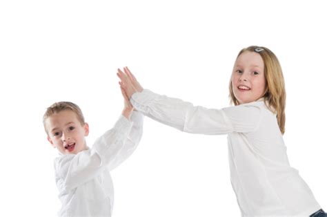 Boy And Girl Double High Five Stock Photo Download Image Now High