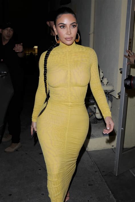 kim kardashian â€“ sexy curves in tight yellow dress at carousel restaurant in glendale 1