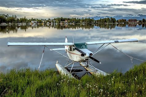 Piper Pa 22 135 Tri Pacer On The Lake Lake Float Plane Clouds Grass