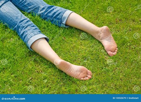 Legs Of Relaxing Woman In Grass Stock Image Image Of Girl Body 13552679