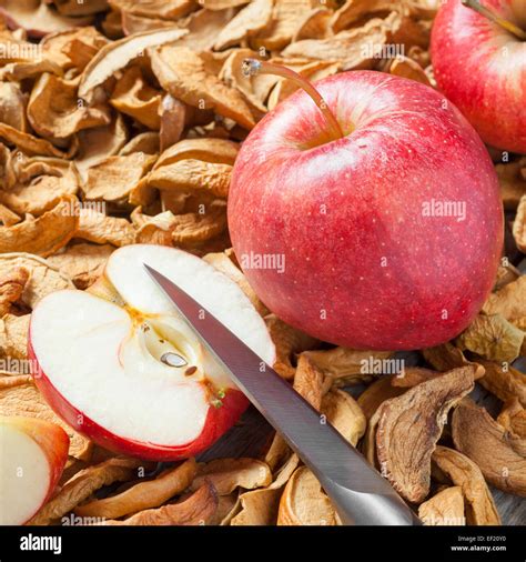 Dried Apple Slices Knife And Red Fresh Red Apple Fruit Close Up Stock
