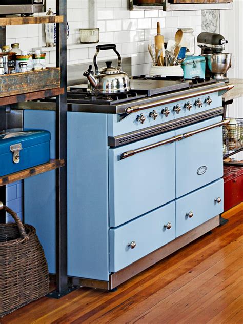 The shelves were made with metal tubing and salvaged indonesian hardwood. Quirky Kitchen Design Ideas to Steal From HGTV Magazine | HGTV