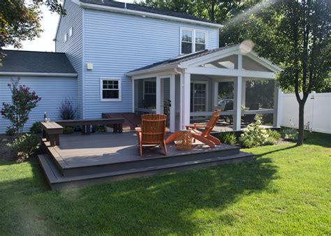 This Custom TimberTech Deck And Porch Was Constructed Using Mocha Decking The Screened In Porch