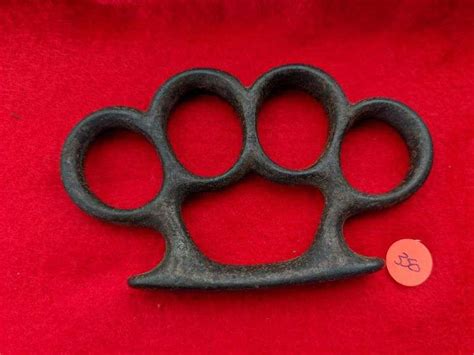 Vintage Cast Iron Knuckles South Auction