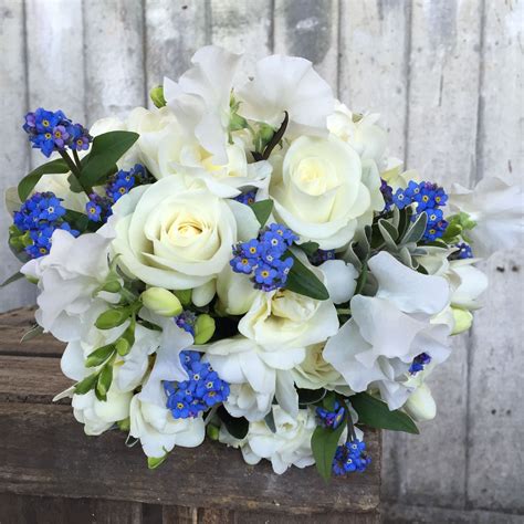 Bouquet Of Forget Me Not Avalanche Roses Freesia And Sweet Peas By
