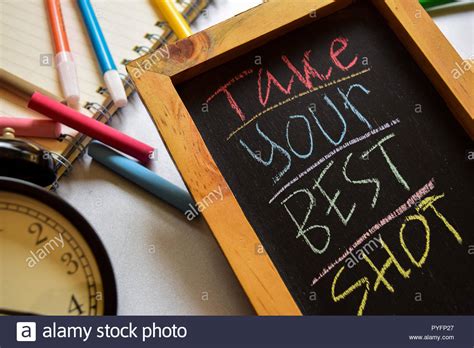 Take Your Best Shot On Phrase Colorful Handwritten On Chalkboard Alarm