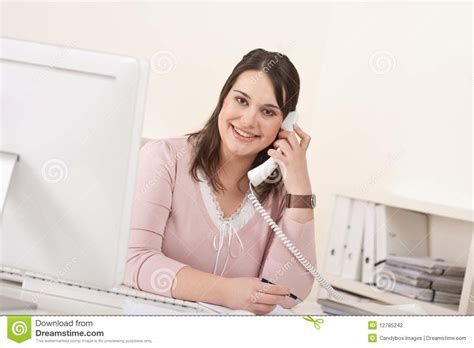 Young Secretary On Phone At Modern Office Stock Photo - Image of female ...