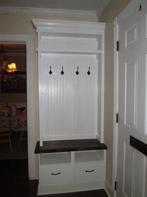 An ikea mudroom bench with storage made of ikea stuva benches and svartsjon hooks. Mini Mudroom from TARVA nightstands - IKEA Hackers