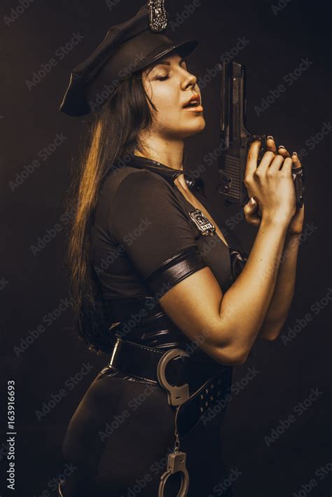 Seductive Police Woman With Gun Stock Photo Adobe Stock