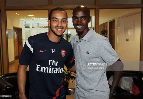 Great Britain Distance Runner Mo Farah Meets Theo Walcott Of Arsenal