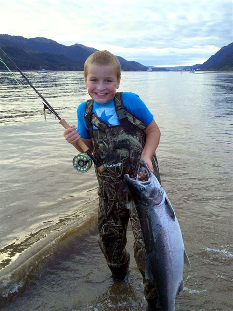Happy Kid Caught His First Big Fish With A Fly Rod Rfishing