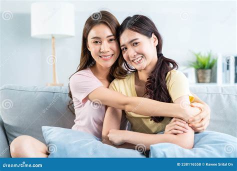 portrait of asian beautiful lesbian woman couple smile look at camera attractive two female