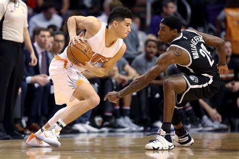 Devin booker has been a shining light in a team that is pretty much going nowhere as the phoenix suns they believe that not only is booker the father of petty's baby but also the father of his high. Suns' Devin Booker Has a Knowledgeable Workout Guru: His ...