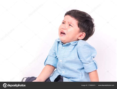 Portrait Of Crying Little Boy On White Background Stock Photo By