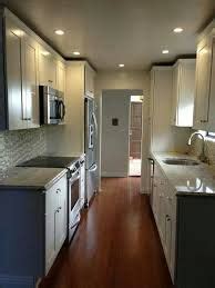 If you locate the sink on the same wall as the stove, with the main work area in the middle, you won't drip water on the floor when you go from the sink to this shape lines up the fridge, sink, and stove on one wall. Image result for narrow galley kitchen with stove and ...