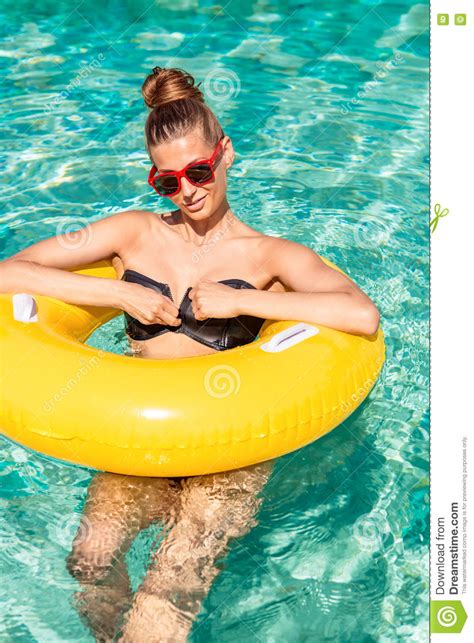 Girl With Yellow Ring At Pool Party Stock Image Image Of Swimsuit