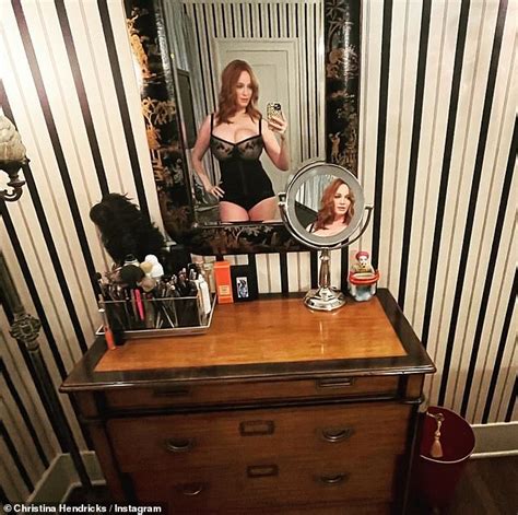 Christina Hendricks Puts On A Busty Display In Clever Two Mirror Selfie