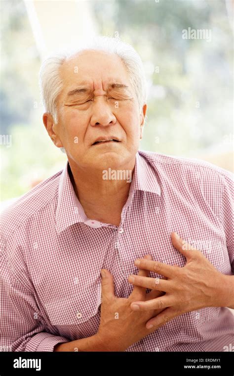 Senior Asian Man With Chest Pain Stock Photo Alamy