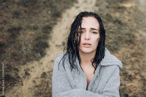 Beautiful Girl Got Wet In The Rain And Froze Upset Sensual Girl With Wet Hair Looking At Camera
