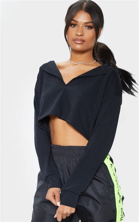 Black Cut Out Crop Sweater Tops Prettylittlething Usa