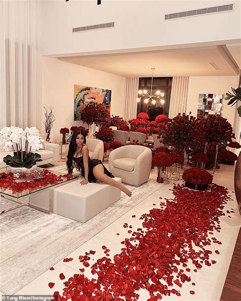 Yung Miami Shows Off Living Room Filled With Red Rose Bouquets From