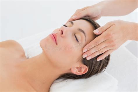Attractive Young Woman Receiving Head Massage At Spa Center Stock Image Image Of Angle