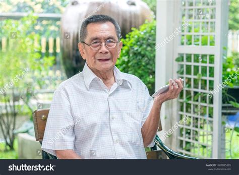 Happy Elderly Asian Old Man Wear Stock Photo 1687095385 Shutterstock