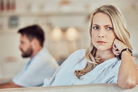wife sulking after fight with her husband and giving the silent treatment caucasian woman