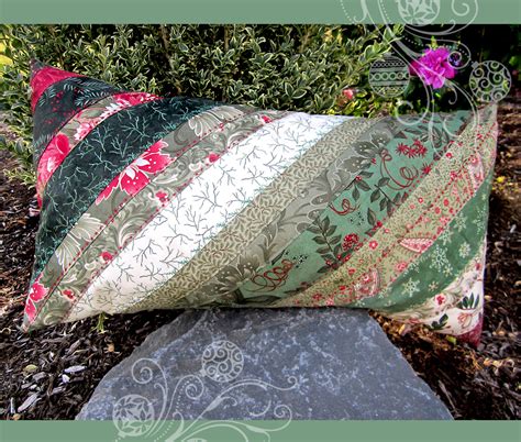 The jelly roll jamboree pillow finishes at 20″ x 20″ but as always, you can add/subtract blocks to make it any size you like! Patchwork Strip Pillow with Decorative Stitching - Sew4Home