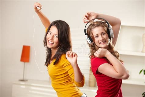 Happy Girls Dancing To Music Stock Photo Image Of Camera Enjoying