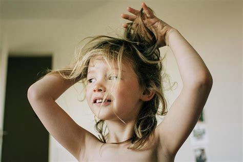 Candid Portrait Of Young Girl With Bed Head Messy Hair After Waking Up