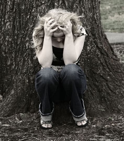 Sad Girl Curled Up Under The Tree Lost Empty Hurt And Broken Photo