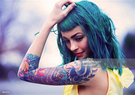 Woman With Blue Hair And Tattoos Photo Getty Images