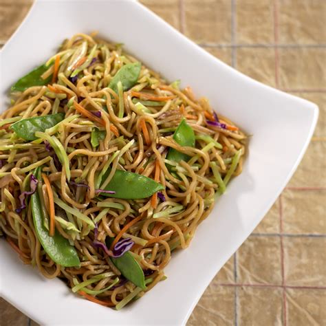 Fragrant ginger, tender veggies and a creamy peanut stir fry sauce come together to make this delicious vegan dish. Lo Mein Noodles with Snow Peas | Mann's Fresh Vegetables