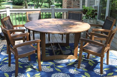 The sunny designs santa fe adjustable round dining table with lazy susan is designed to accommodate your casual style and generous hospitality. Large Round Eucalyptus Wood 63" Lazy Susan Dining Table