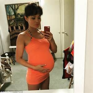 Pregnant Yumi Stynes Displays Her Growing Belly In Bathroom Selfie