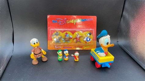 4 The Disney Afternoon Set Of 4 Figurines Caveman Donald Duck Toy