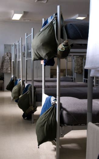 Military Dorm Room With Bunkbeds And Equipment Stock Photo Download