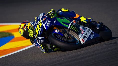 Download Valentino Rossi Mastering A Stunning Banking Curve Wallpaper Wallpapers Com