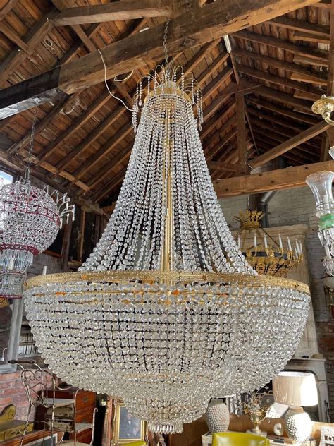 Monumental 20th Century Classic Cascade Chandelier With Gold Metal Ban
